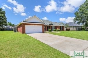 single story home featuring driveway, an attached garage, and a front yard