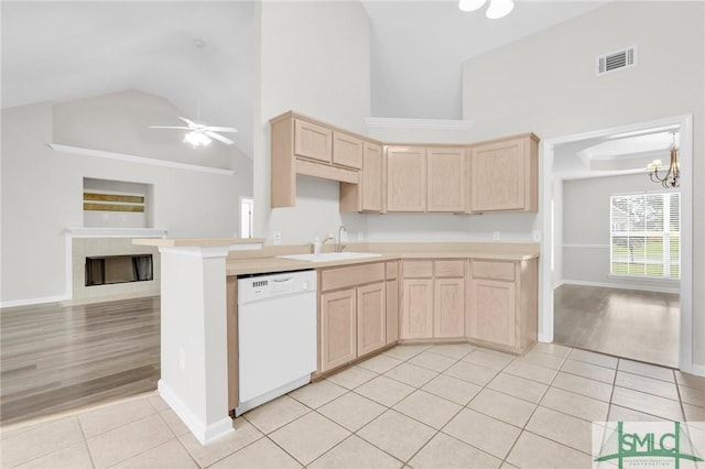 kitchen featuring light tile patterned floors, visible vents, white dishwasher, light brown cabinetry, and open floor plan