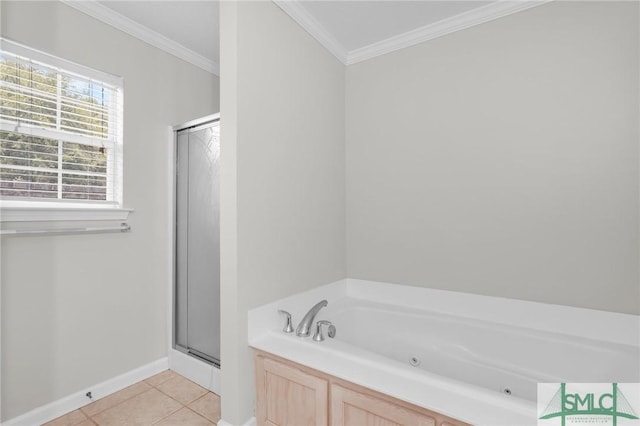 bathroom with a tub with jets, baseboards, a stall shower, tile patterned flooring, and crown molding