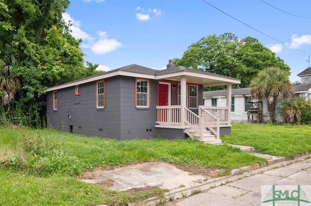 view of front of home with a front yard