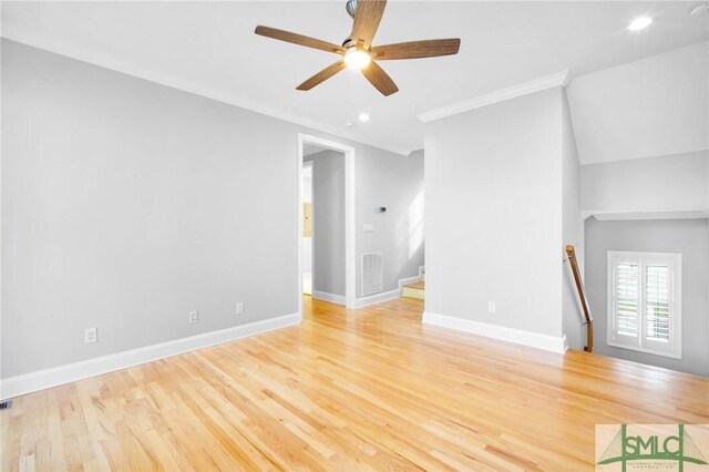 interior space featuring ceiling fan, crown molding, and light hardwood / wood-style flooring