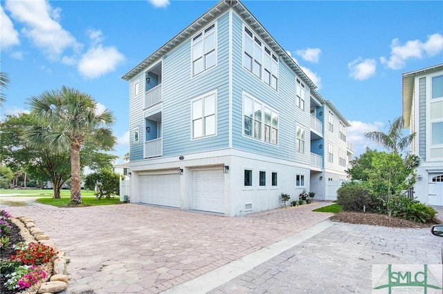 view of property featuring a garage