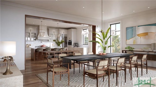 dining area with ornamental molding and dark wood-type flooring