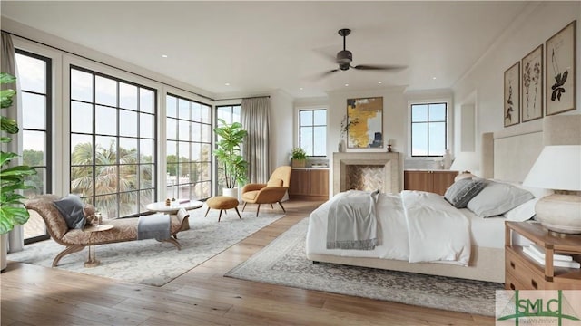 bedroom featuring crown molding and light hardwood / wood-style flooring