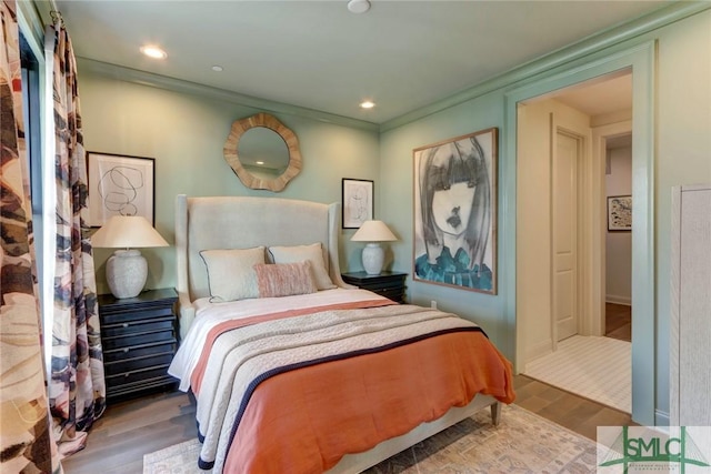 bedroom featuring wood-type flooring