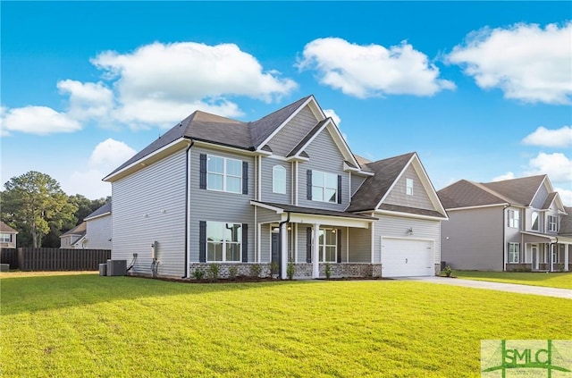 view of front of property featuring central AC unit, a garage, covered porch, and a front lawn