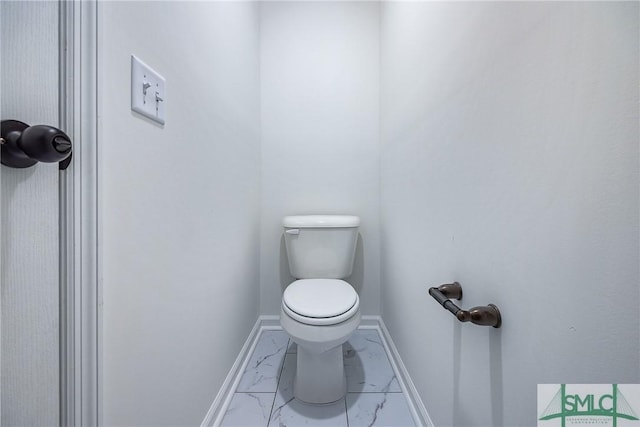 12 Cottonfield Dr, Guyton, GA 31312 - bathroom with marble look tiles and toilet