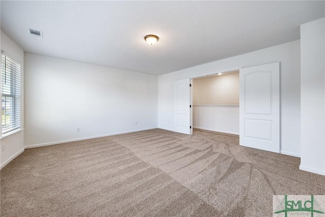 12 Cottonfield Dr, Guyton, GA 31312 - unfurnished bedroom featuring carpet floors