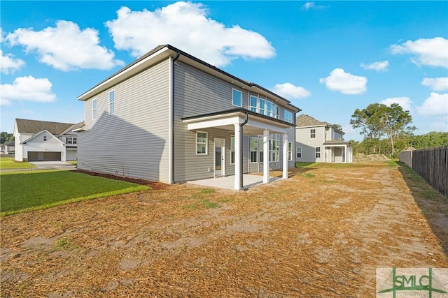 12 Cottonfield Dr, Guyton, GA 31312 - rear view of property featuring a patio