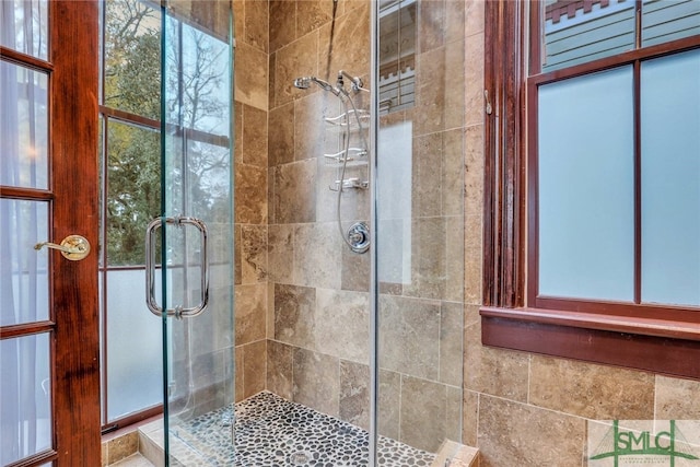 bathroom featuring an enclosed shower