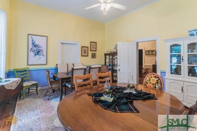 dining area featuring ceiling fan and light wood-type flooring