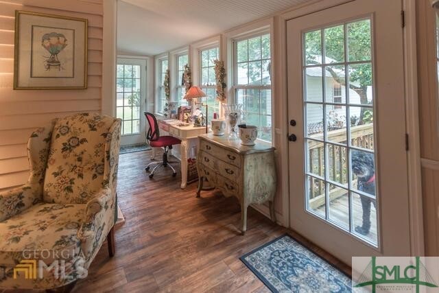 doorway featuring wood-type flooring