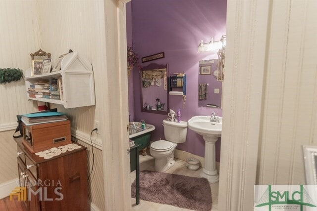 bathroom with sink and toilet