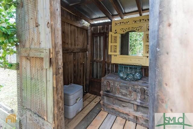 view of sauna featuring hardwood / wood-style flooring