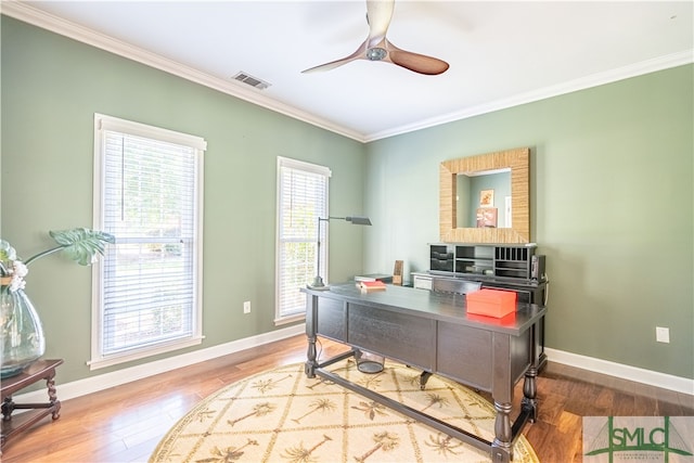 office with ceiling fan, wood-type flooring, and ornamental molding