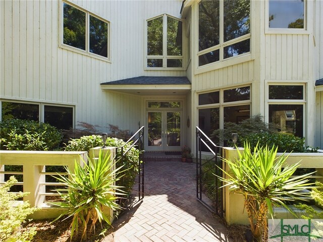 doorway to property featuring french doors