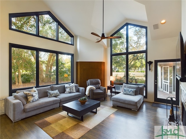 sunroom with plenty of natural light and vaulted ceiling