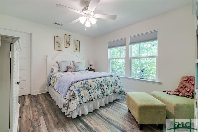 bedroom featuring wood-type flooring and ceiling fan