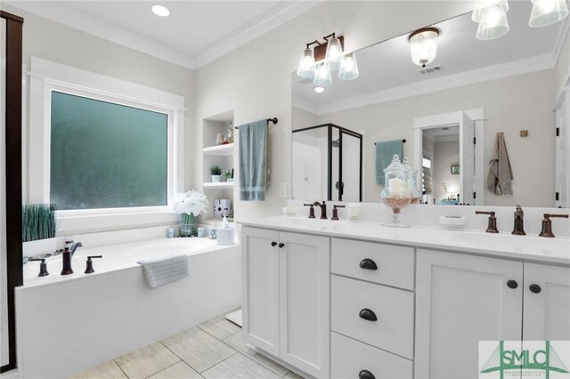 bathroom with plus walk in shower, vanity, and ornamental molding