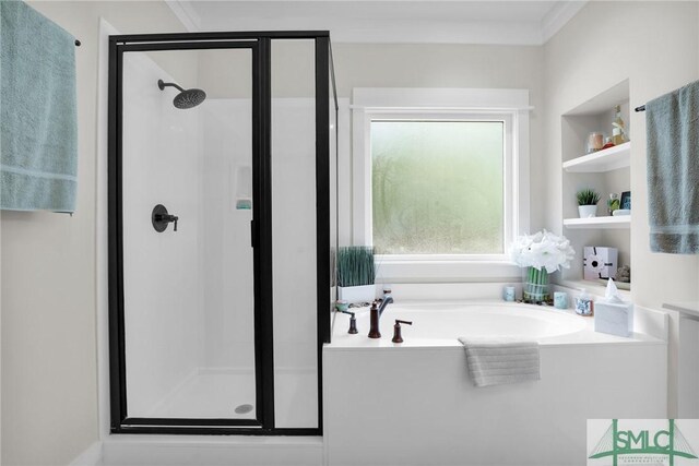 bathroom featuring separate shower and tub and ornamental molding