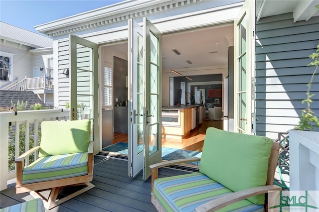 balcony featuring french doors