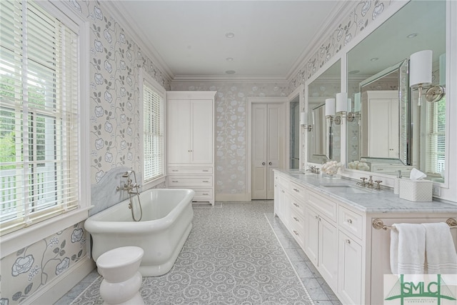 bathroom featuring plenty of natural light, vanity, a bath, and ornamental molding