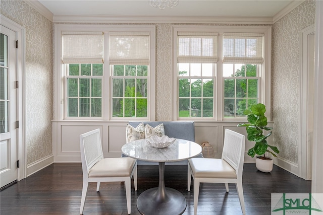 sunroom featuring breakfast area