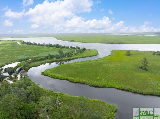 aerial view featuring a rural view and a water view