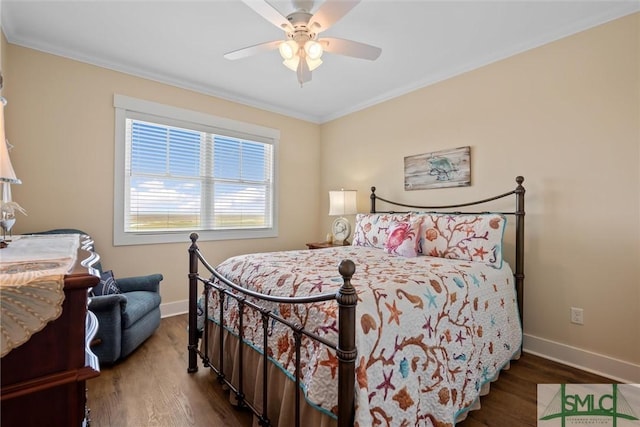 bedroom featuring hardwood / wood-style flooring, ornamental molding, and ceiling fan