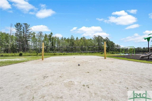 view of nearby features with a playground and volleyball court