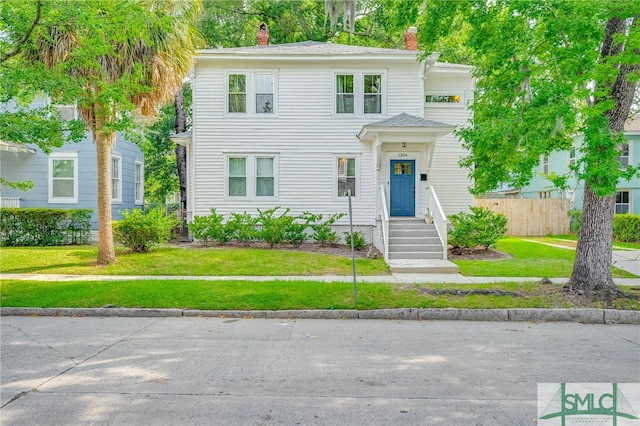 view of front of property with a front yard