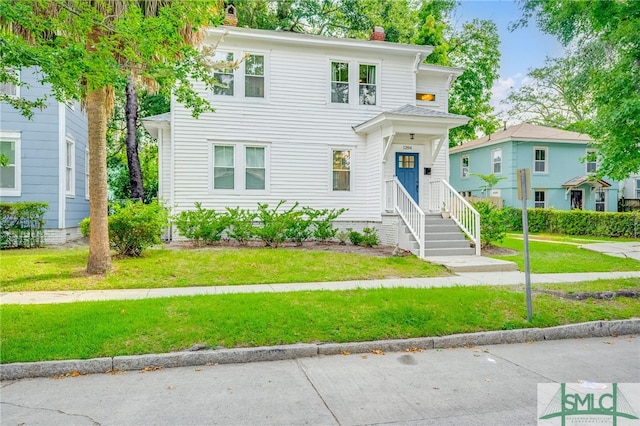 view of front of house featuring a front yard