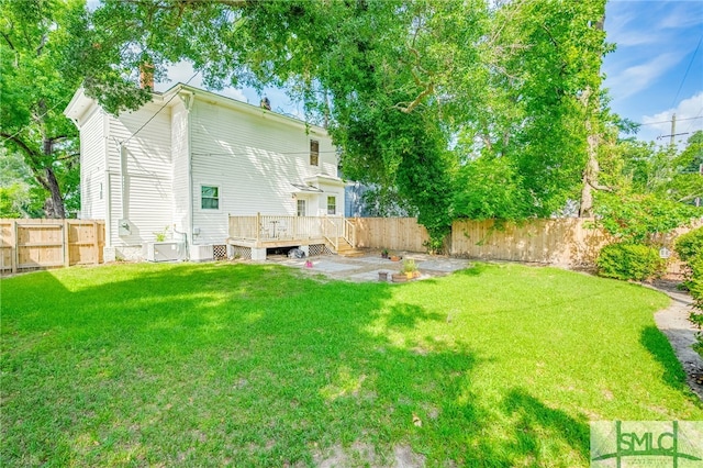 view of yard featuring a deck