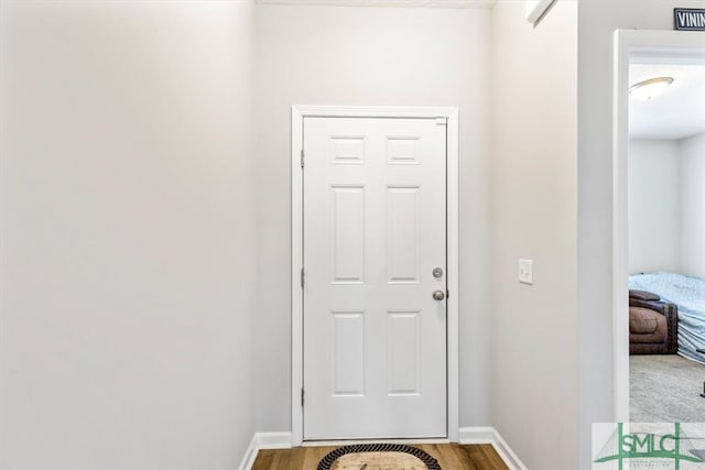 entryway featuring carpet floors