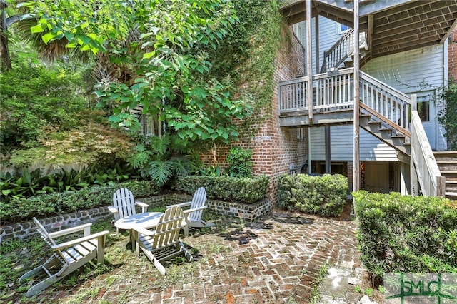 view of patio with a wooden deck