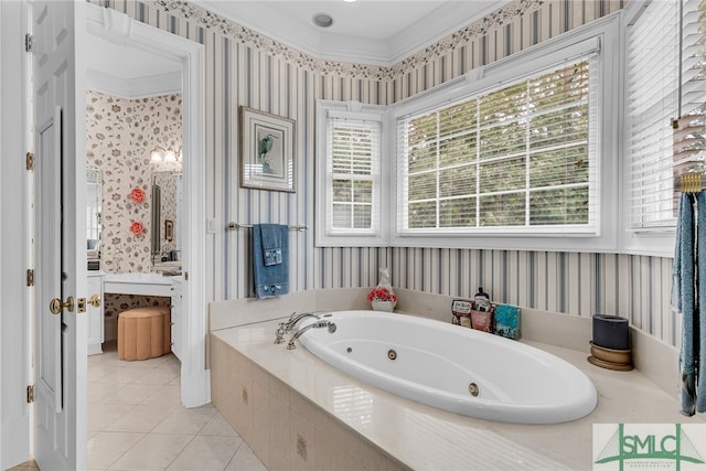 bathroom featuring tiled bath, vanity, tile floors, and crown molding