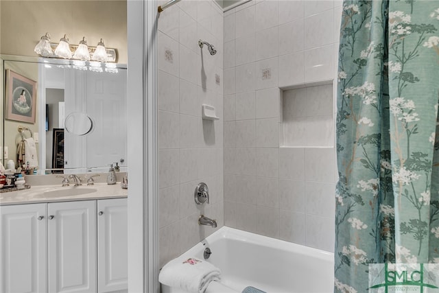 bathroom featuring vanity and shower / tub combo