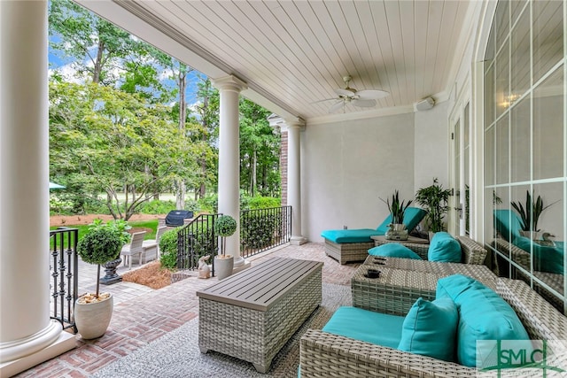 view of terrace featuring ceiling fan