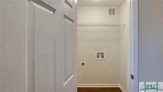 washroom featuring washer hookup, visible vents, hookup for an electric dryer, laundry area, and baseboards