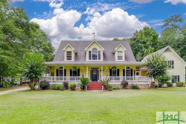 cape cod house featuring a porch and a front lawn