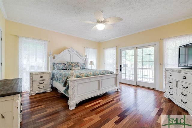 bedroom featuring ceiling fan, dark hardwood / wood-style flooring, a textured ceiling, and access to outside