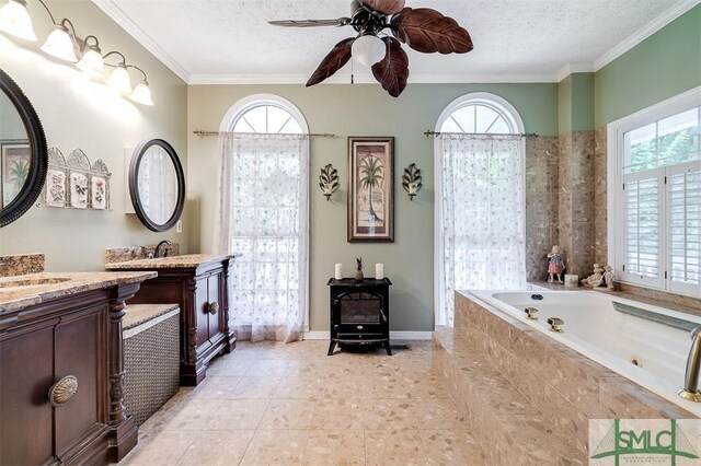 bathroom featuring a textured ceiling, a wood stove, plenty of natural light, and tiled tub