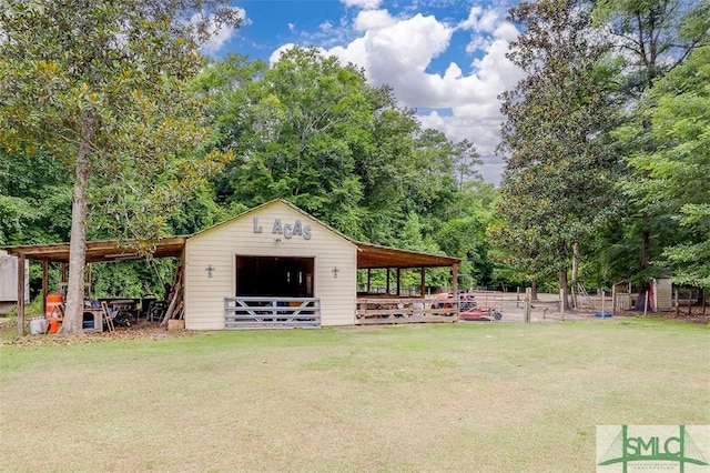 view of outdoor structure with a lawn