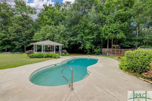 view of swimming pool featuring a gazebo and a lawn