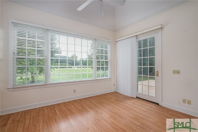 unfurnished sunroom featuring ceiling fan and lofted ceiling