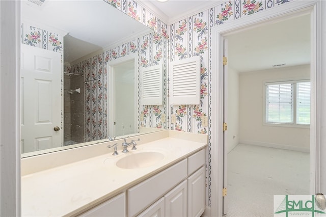 bathroom featuring vanity, walk in shower, and crown molding