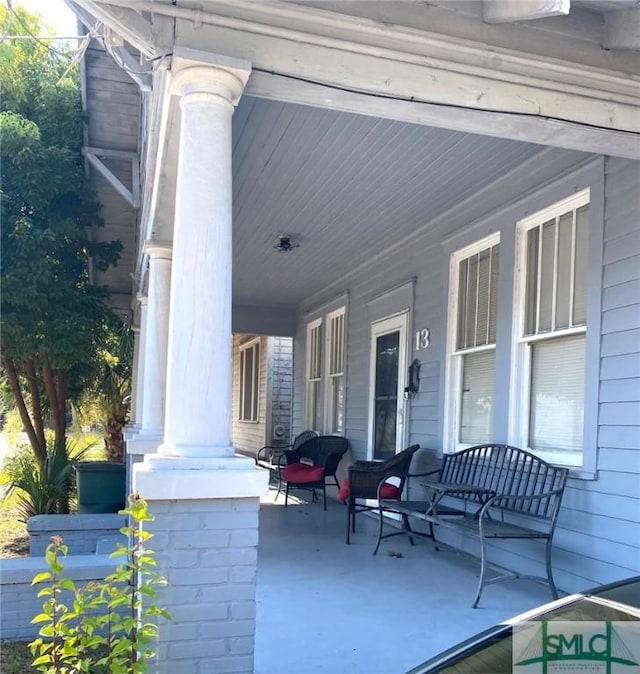 view of patio featuring covered porch