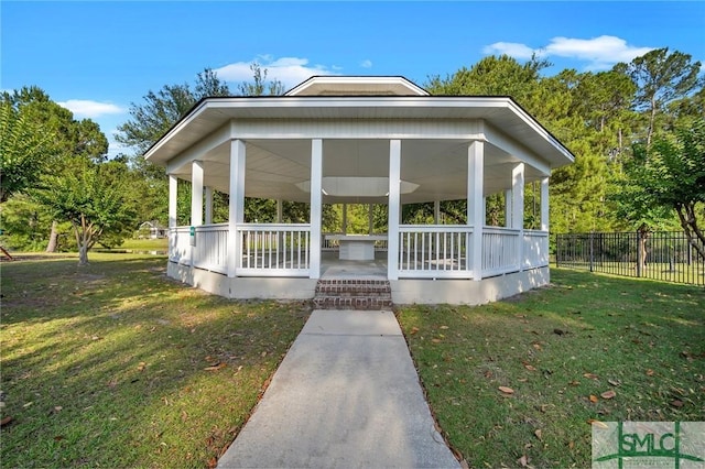 exterior space with a front yard and covered porch