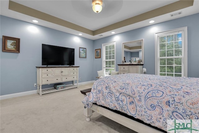 bedroom featuring ceiling fan and light carpet