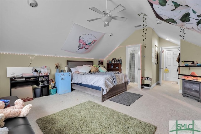 carpeted bedroom featuring lofted ceiling